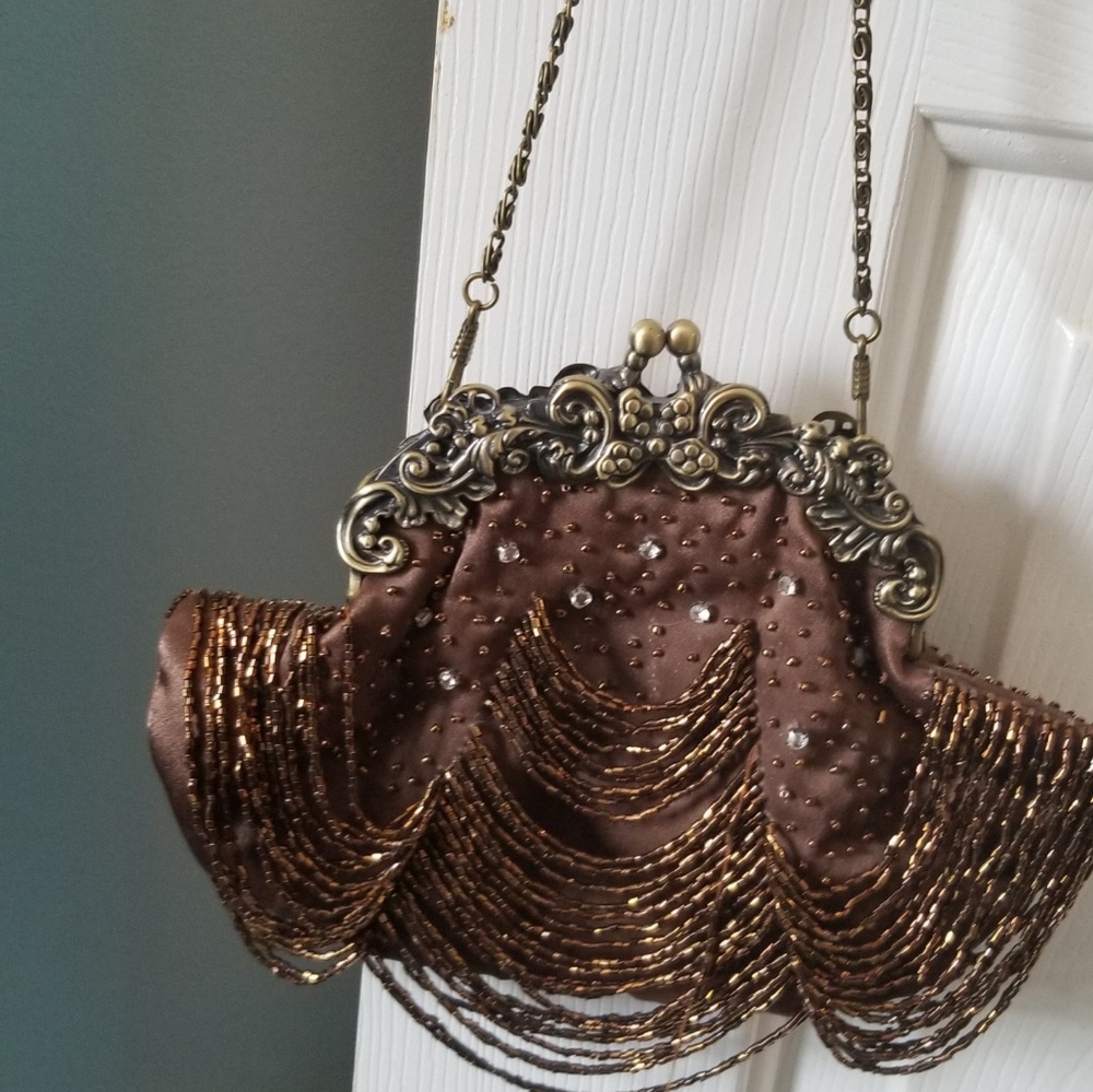 Brown beaded clutch